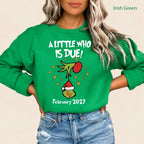 Funny Christmas Pregnancy Announcement Sweatshirt for Moms-To-Be Due May 2027 Reveal