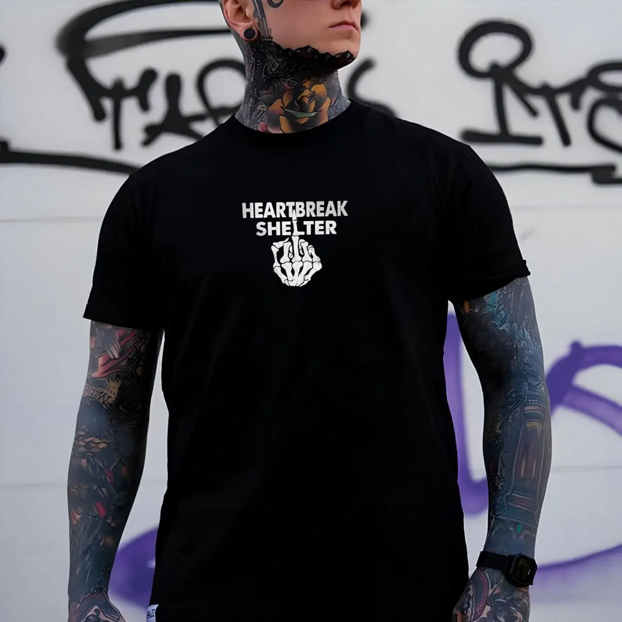 MadFits Black Heartbreak Shelter Tee Front View Skeleton Hand Detail