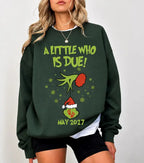Funny Christmas Pregnancy Announcement Sweatshirt for Moms-To-Be Due May 2027 Reveal