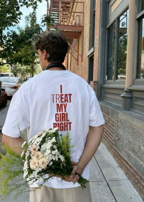 MadFits White I Treat My Girl Right Tee Lifestyle Back View Holding Flowers